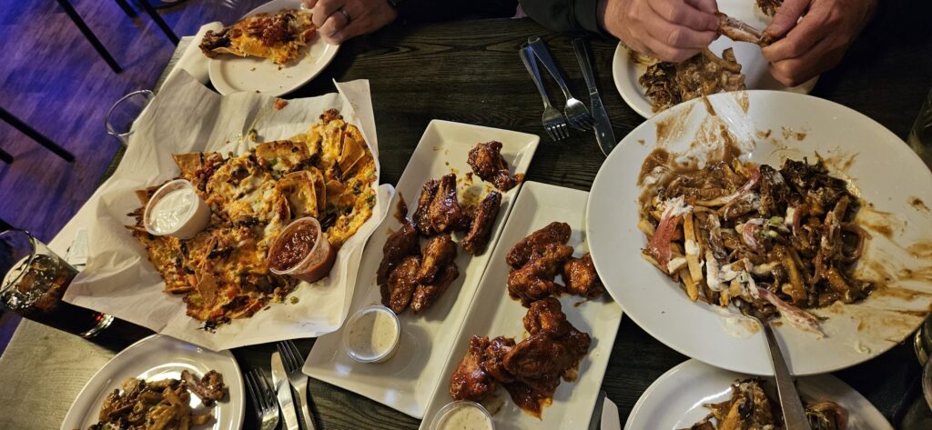 Pub food; nachos, wings, and poutine