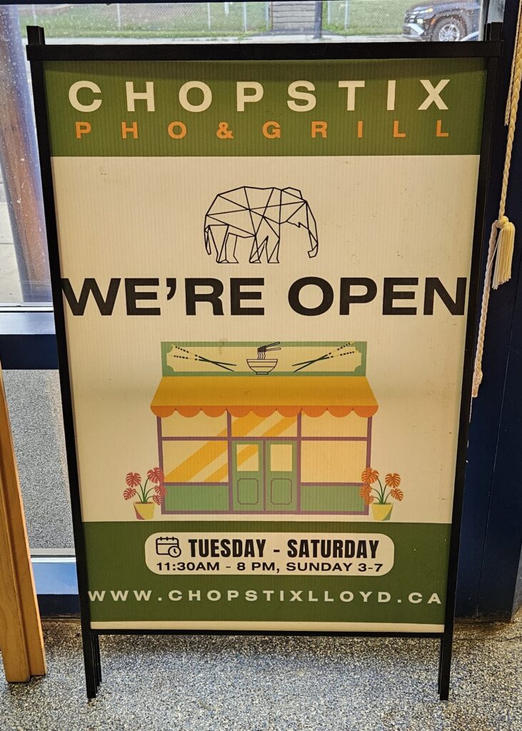 A sign for Chopstix a Pho restaurant in Lloydminster, Saskatchewan