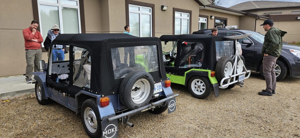 Two Mini Mokes sitting outside Whitecourt Baptist Church